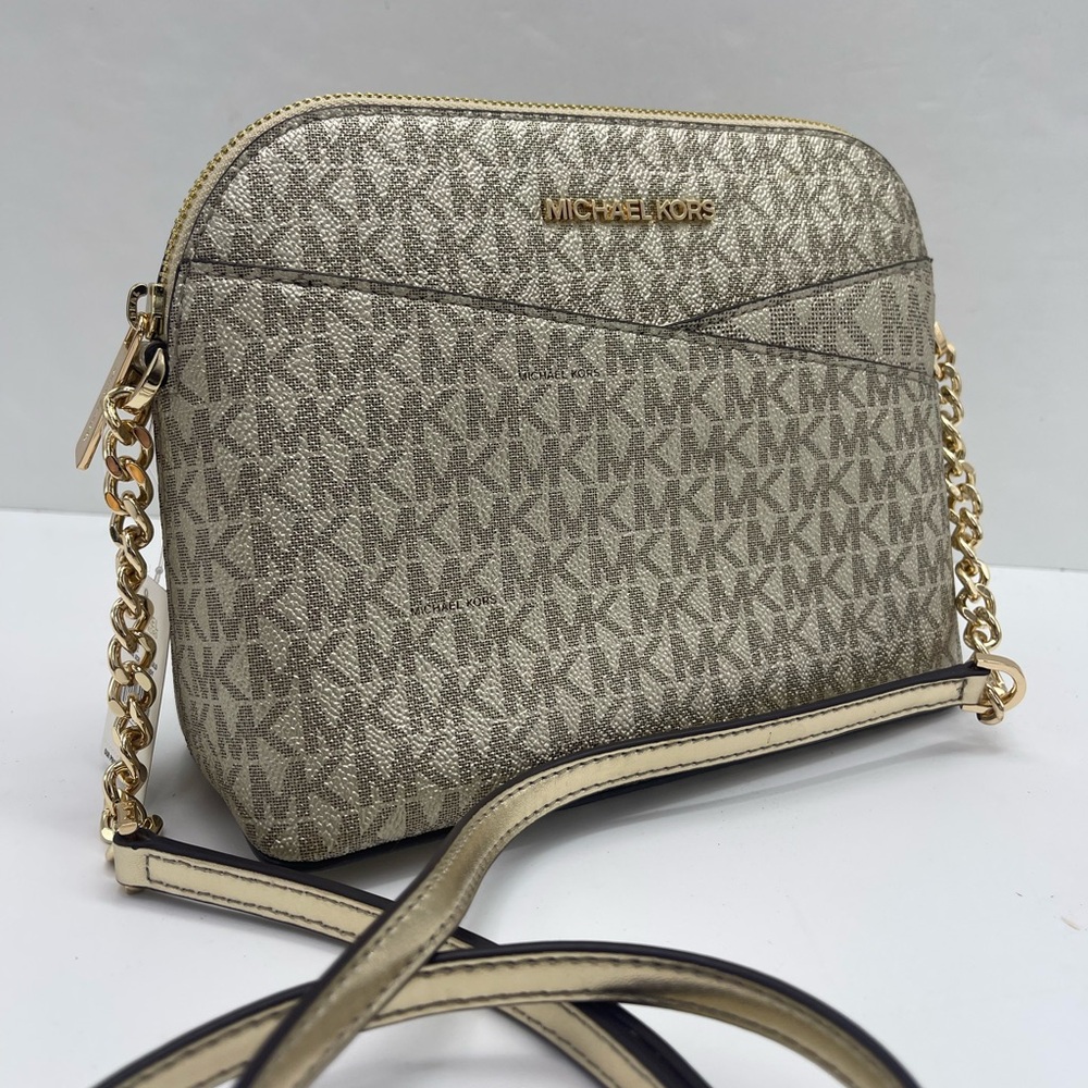 Michael Kors Jet Set Travel Signat Md Dome Crossbody  XCROSS XBODY
Pale Gold
NWT